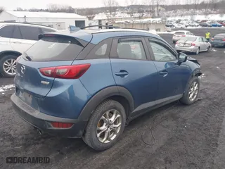 2018 Mazda CX-3 Sport with VIN JM1DKFB74J0320352, listed as a IAAI auction lot 41542089 with 111,017 mi miles. Bid and sale history available at carsss.com. Image 4.