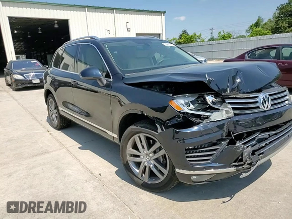 2015 Volkswagen Touareg Lux z VIN WVGEP9BP2FD006802, wystawiony jako Copart lot #52291965 z przebiegiem 122 787 mil mil oraz Szkoda całkowita • Salvage title. Historia ofert i sprzedaży dostępna na DreamBid. Obrazek 10.