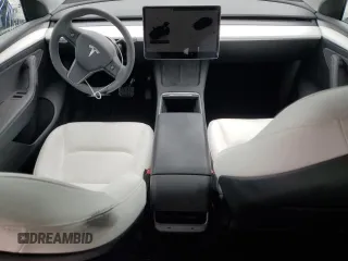 2023 Tesla Model Y Long Range z VIN 7SAYGDEE5PF787794, wystawiony jako Copart lot #55212605 z przebiegiem 30 277 mil mil oraz Szkoda całkowita • Salvage title. Historia ofert i sprzedaży dostępna na DreamBid. Obrazek 8.