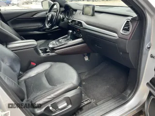 2017 Mazda CX-9 Grand Touring with VIN JM3TCADY7H0136915, listed as a Copart auction lot 57106855 with 135,872 mi miles and Clean title. Bid and sale history available at DreamBid. Image 5.