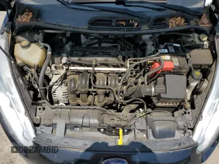 2014 Ford Fiesta SE z VIN 3FADP4BJ9EM176730, wystawiony jako Copart lot #58806365 z przebiegiem 93 814 mil mil oraz Szkoda całkowita • Salvage title. Historia ofert i sprzedaży dostępna na DreamBid. Obrazek 11.