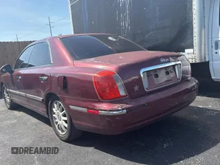 2005 Hyundai XG z VIN KMHFU45E95A381631, wystawiony jako Copart lot #57705005 z przebiegiem 202 730 mil mil oraz Tytuł czysty. Historia ofert i sprzedaży dostępna na DreamBid. Obrazek 3.