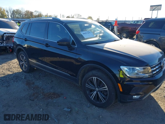 2018 Volkswagen Tiguan SEL with VIN 3VV3B7AX7JM117053, listed as a IAAI auction lot 40827695 with 71,489 mi miles and . Bid and sale history available at DreamBid. Image 1.