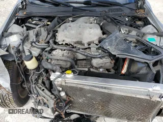 2004 Infiniti G35 w/Leather with VIN JNKCV51F94M717606, listed as a Copart auction lot 74712714 with 197,420 mi miles and Salvage Title. Bid and sale history available at DreamBid. Image 12.