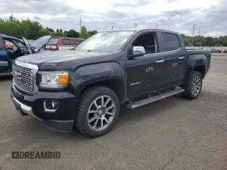2020 GMC Canyon 4WD Denali with VIN 1GTG6EEN0L1243031, listed as a Copart auction lot 67939014 with 106,294 mi miles and Salvage Title. Bid and sale history available at carsss.com. Image 1.