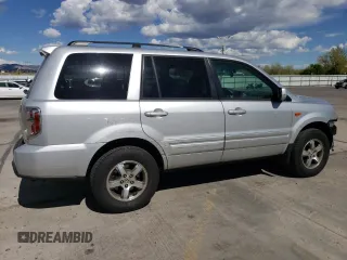 2007 Honda Pilot EX-L with VIN 5FNYF18557B013183, listed as a Copart auction lot 54945045 with 183,188 mi miles and Salvage Title. Bid and sale history available at DreamBid. Image 3.