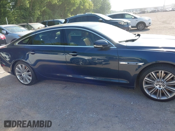 2013 Jaguar XJ Supercharged with VIN SAJWA2GE8DMV43164, listed as a IAAI auction lot 42549807 with 59,744 mi miles and . Bid and sale history available at DreamBid. Image 13.