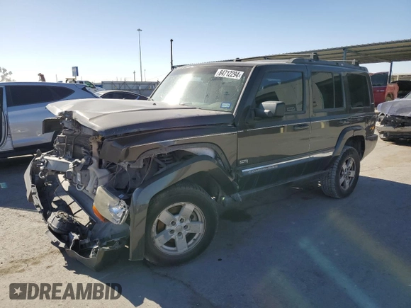 2006 Jeep Commander with VIN 1J8HH48K26C263986, listed as a Copart auction lot 84712294 with 216,923 mi miles and Salvage title. Bid and sale history available at DreamBid. Image 1.