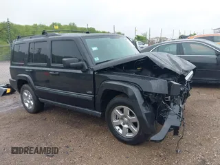 2007 Jeep Commander Sport z VIN 1J8HG48P17C632997, wystawiony jako IAAI lot #42319292 z przebiegiem 99 129 mil mil oraz . Historia ofert i sprzedaży dostępna na DreamBid. Obrazek 1.