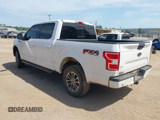 2020 Ford F-150 XL with VIN 1FTEW1E59LKE78957, listed as a IAAI auction lot 42021245 with 92,322 mi miles and . Bid and sale history available at DreamBid. Image 3.