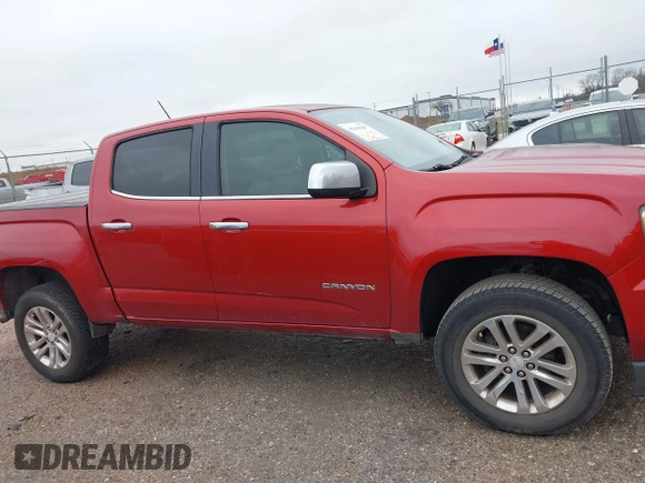 2015 GMC Canyon 2WD SLT with VIN 1GTG5CE3XF1211164, listed as a IAAI auction lot 41490387 with 163,932 mi miles. Bid and sale history available at carsss.com. Image 13.
