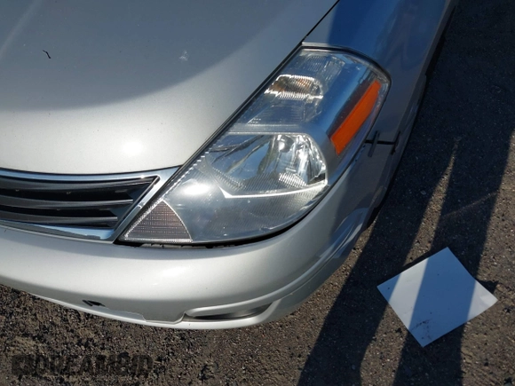 2012 Nissan Versa S with VIN 3N1BC1CP7CK253573, listed as a IAAI auction lot 42035812 with 97,026 mi miles. Bid and sale history available at carsss.com. Image 6.
