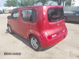 2009 Nissan Cube S z VIN JN8AZ28RX9T117772, wystawiony jako IAAI lot #42310747 z przebiegiem 147 582 mil mil oraz . Historia ofert i sprzedaży dostępna na DreamBid. Obrazek 3.