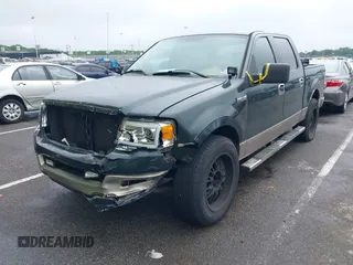 2004 Ford F-150 XLT with VIN 1FTPW12574KC02677, listed as a IAAI auction lot 42210053 with 145,425 mi miles and . Bid and sale history available at DreamBid. Image 2.