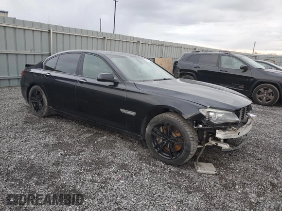 2011 BMW 7 Series 750i xDrive with VIN WBAKC6C54BC395163, listed as a Copart auction lot 82184484 with 74,331 mi miles and Clean title. Bid and sale history available at DreamBid. Image 4.