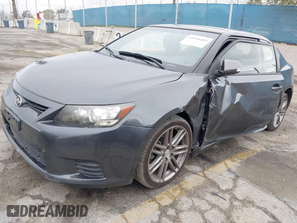 2013 Scion tC with VIN JTKJF5C76D3063500, listed as a IAAI auction lot 41916403 with 146,818 mi miles. Bid and sale history available at carsss.com. Image 2.