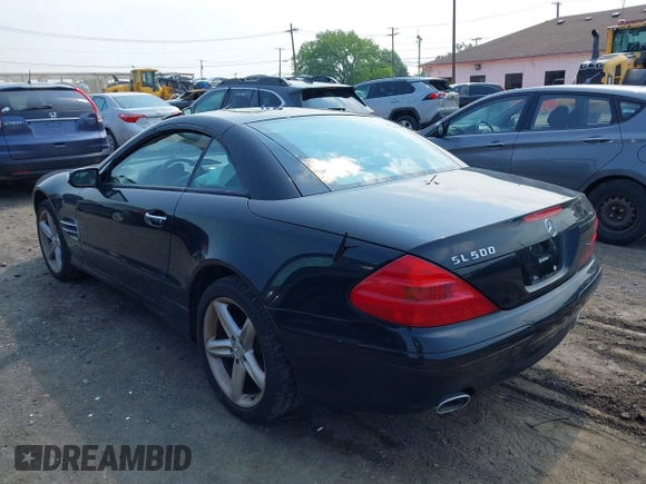 2005 Mercedes-Benz SL 500 with VIN WDBSK75F25F088450, listed as a IAAI auction lot 42424662 with 104,259 mi miles and . Bid and sale history available at DreamBid. Image 3.