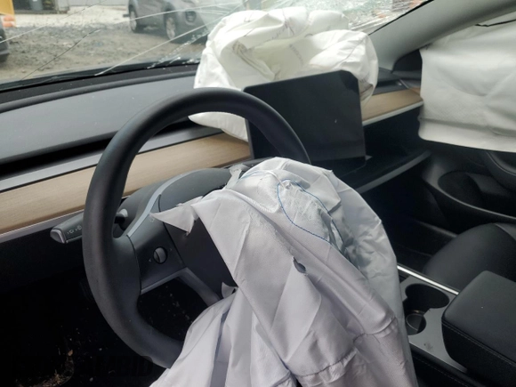 2023 Tesla Model 3 с VIN 5YJ3E1EA3PF426945, выставлен на аукционе Copart как лот 62584185 с пробегом Не указан миль и Списание • Salvage title. История ставок и продаж доступна на DreamBid. Изображение 9.