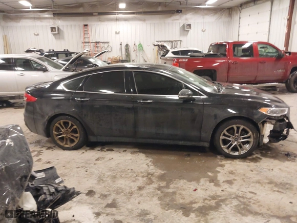 2020 Ford Fusion Hybrid Titanium with VIN 3FA6P0RU8LR141355, listed as a IAAI auction lot 41417807 with 61,288 mi miles. Bid and sale history available at carsss.com. Image 13.