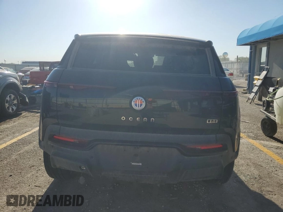 2023 Fisker Ocean One z VIN VCF1ZBU27PG005912, wystawiony jako Copart lot #57087925 z przebiegiem Nie podano mil oraz Szkody całkowita. Historia ofert i sprzedaży dostępna na DreamBid. Obrazek 6.