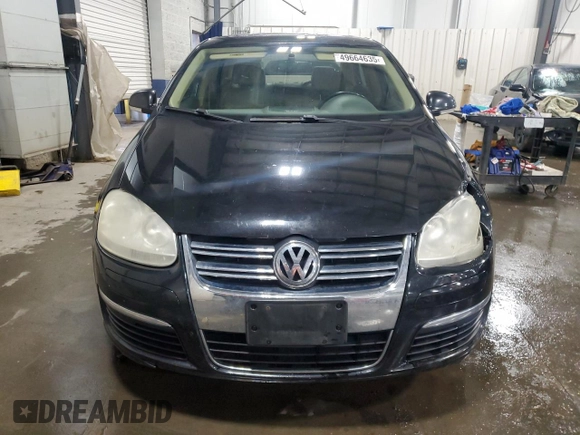 2006 Volkswagen Jetta 1.9L TDI z VIN 3VWDT71K06M752110, wystawiony jako Copart lot #49664635 z przebiegiem 156 883 mil mil oraz Szkoda całkowita • Salvage title. Historia ofert i sprzedaży dostępna na DreamBid. Obrazek 5.
