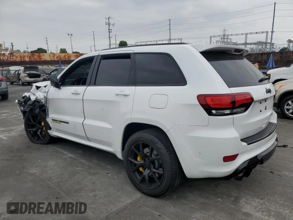 2018 Jeep Grand Cherokee Trackhawk with VIN 1C4RJFN91JC293695, listed as a Copart auction lot 59031525 with 8,565 mi miles and Salvage title. Bid and sale history available at DreamBid. Image 2.