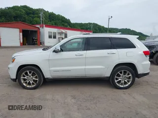 2014 Jeep Grand Cherokee Summit z VIN 1C4RJFJTXEC346627, wystawiony jako IAAI lot #42332200 z przebiegiem 231 007 mil mil oraz . Historia ofert i sprzedaży dostępna na DreamBid. Obrazek 14.