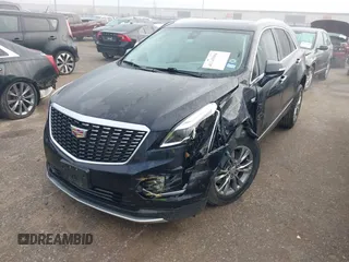 2021 Cadillac XT5 FWD Premium Luxury with VIN 1GYKNCRS2MZ185678, listed as a IAAI auction lot 41143084 with 25,399 mi miles and . Bid and sale history available at carsss.com. Image 17.