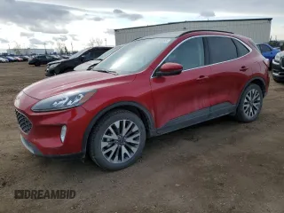 2020 Ford Escape Titanium z VIN 1FMCU9J95LUA42353, wystawiony jako Copart lot #50520355 z przebiegiem 76 942 mil mil oraz Szkody całkowita. Historia ofert i sprzedaży dostępna na DreamBid. Obrazek 1.