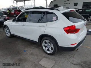 2015 BMW X1 sDrive28i with VIN WBAVM1C53FV318663, listed as a IAAI auction lot 41711526 with 182,204 mi miles. Bid and sale history available at carsss.com. Image 3.