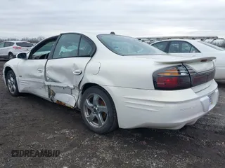 2004 Pontiac Bonneville SLE z VIN 1G2HY52K54U215710, wystawiony jako IAAI lot #41497635 z przebiegiem 123 343 mil mil oraz . Historia ofert i sprzedaży dostępna na DreamBid. Obrazek 3.