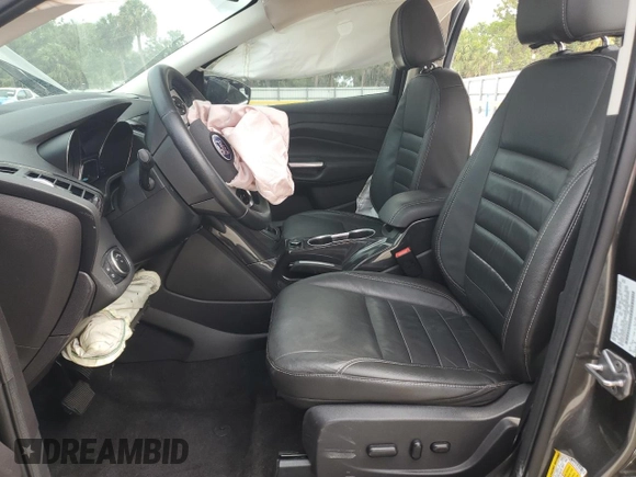 2016 Ford Escape Titanium with VIN 1FMCU9J91GUA47829, listed as a Copart auction lot 54051275 with 86,046 mi miles and Salvage Title. Bid and sale history available at DreamBid. Image 7.