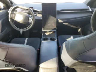 2023 Fisker Ocean One z VIN VCF1ZBU24PG003938, wystawiony jako Copart lot #89353135 z przebiegiem Nie podano mil oraz Szkody całkowita. Historia ofert i sprzedaży dostępna na DreamBid. Obrazek 8.