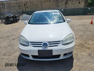 2009 Volkswagen Rabbit S with VIN WVWDB71K79W120196, listed as a Copart auction lot 62126625 with 105,695 mi miles and Salvage title. Bid and sale history available at DreamBid. Image 5.