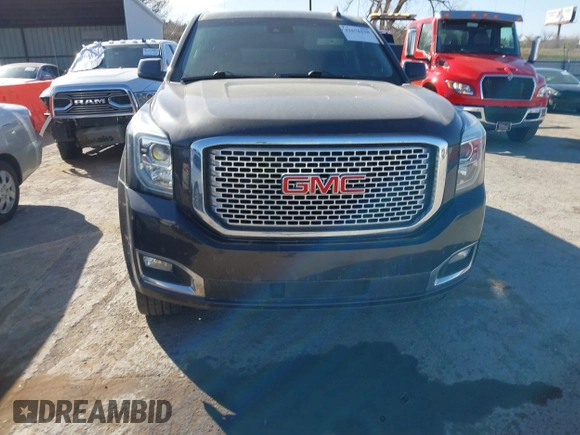 2015 GMC Yukon XL Denali with VIN 1GKS2JKJ9FR634771, listed as a IAAI auction lot 41676218 with 73,271 mi miles. Bid and sale history available at carsss.com. Image 12.