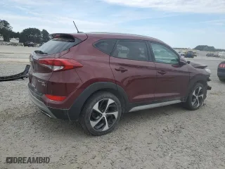2017 Hyundai Tucson Sport with VIN KM8J3CA26HU406958, listed as a Copart auction lot 50795255 with 106,406 mi miles and Salvage Title. Bid and sale history available at carsss.com. Image 3.