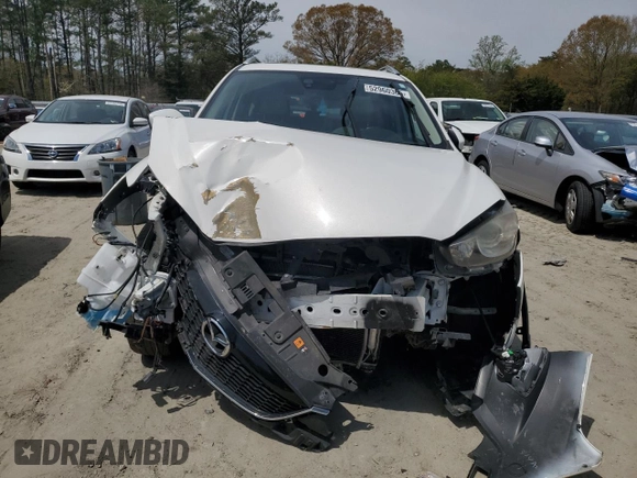 2015 Mazda CX-5 Grand Touring with VIN JM3KE4DY0F0458719, listed as a Copart auction lot 52960365 with 128,372 mi miles and Salvage Title. Bid and sale history available at DreamBid. Image 5.