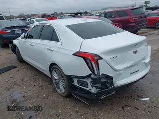 2023 Cadillac CT4 Premium Luxury z VIN 1G6DB5RK1P0129620, wystawiony jako IAAI lot #41568111 z przebiegiem 32 453 mil mil oraz . Historia ofert i sprzedaży dostępna na DreamBid. Obrazek 3.