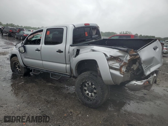 2013 Toyota Tacoma with VIN 5TFLU4EN8DX065656, listed as a Copart auction lot 63486165 with 185,018 mi miles and Salvage title. Bid and sale history available at DreamBid. Image 2.