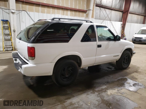1999 Chevrolet Blazer LS with VIN 1GNCT18W5XK136973, listed as a Copart auction lot 60284865 with 199,759 mi miles and Clean title. Bid and sale history available at DreamBid. Image 3.