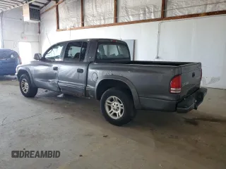 2004 Dodge Dakota Sport z VIN 1D7HL38N54S536938, wystawiony jako Copart lot #52455345 z przebiegiem 157 791 mil mil oraz Szkody całkowita. Historia ofert i sprzedaży dostępna na DreamBid. Obrazek 2.