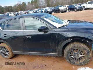 2020 Mazda CX-5 Touring z VIN JM3KFBCMXL1741182, wystawiony jako IAAI lot #41602315 z przebiegiem 31 582 mil mil oraz . Historia ofert i sprzedaży dostępna na DreamBid. Obrazek 14.