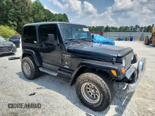 2001 Jeep Wrangler Sport с VIN 1J4FA49S91P347090, выставлен на аукционе Copart как лот 60436405 с пробегом 141 172 миль миль и Списание • Salvage title. История ставок и продаж доступна на DreamBid. Изображение 4.