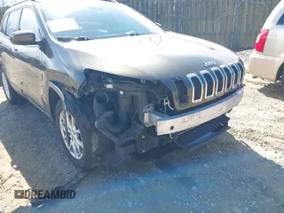 2014 Jeep Cherokee Latitude with VIN 1C4PJMCS5EW201462, listed as a IAAI auction lot 41727379 with 170,958 mi miles and . Bid and sale history available at DreamBid. Image 6.