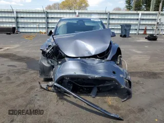 2023 Tesla Model Y Long Range with VIN 7SAYGDEE9PF885405, listed as a Copart auction lot 52858105 with 23,424 mi miles and Non Repairable. Bid and sale history available at DreamBid. Image 5.