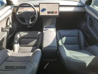 2022 Tesla Model 3 with VIN 5YJ3E1EA8NF322335, listed as a Copart auction lot 48187265 with 22,265 mi miles and Clean Title. Bid and sale history available at DreamBid. Image 8.