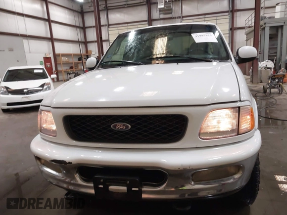 1998 Ford F-150 с VIN 1FTRX18L1WKB99239, выставлен на аукционе IAAI как лот 41987823 с пробегом 217 930 миль миль и . История ставок и продаж доступна на DreamBid. Изображение 12.