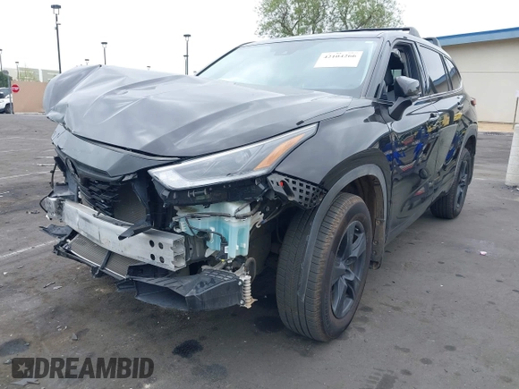 2021 Toyota Highlander L with VIN 5TDCZRAH1MS085834, listed as a IAAI auction lot 42104266 with 48,133 mi miles and . Bid and sale history available at DreamBid. Image 2.
