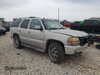 2004 GMC Yukon SLT with VIN 1GKEC13Z34R313210, listed as a Copart auction lot 51150575 with 328,961 mi miles and Salvage Title. Bid and sale history available at carsss.com. Image 4.