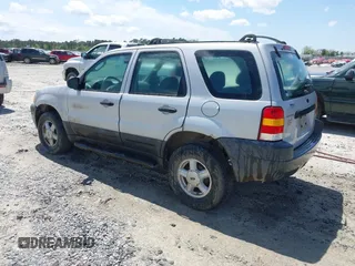 2003 Ford Escape XLS Popular z VIN 1FMYU02183KC05213, wystawiony jako IAAI lot #41955134 z przebiegiem 305 524 mil mil oraz . Historia ofert i sprzedaży dostępna na DreamBid. Obrazek 3.